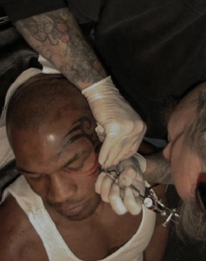 mike tyson getting face tattoo